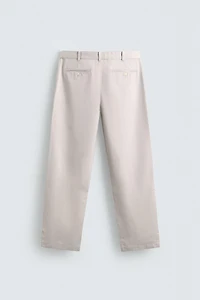 RELAXED FIT PLEATED PANTS