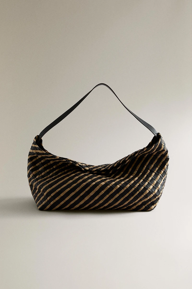 WOVEN LEATHER CLUTCH