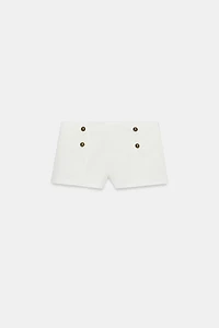 MINI SHORT À BOUTONS