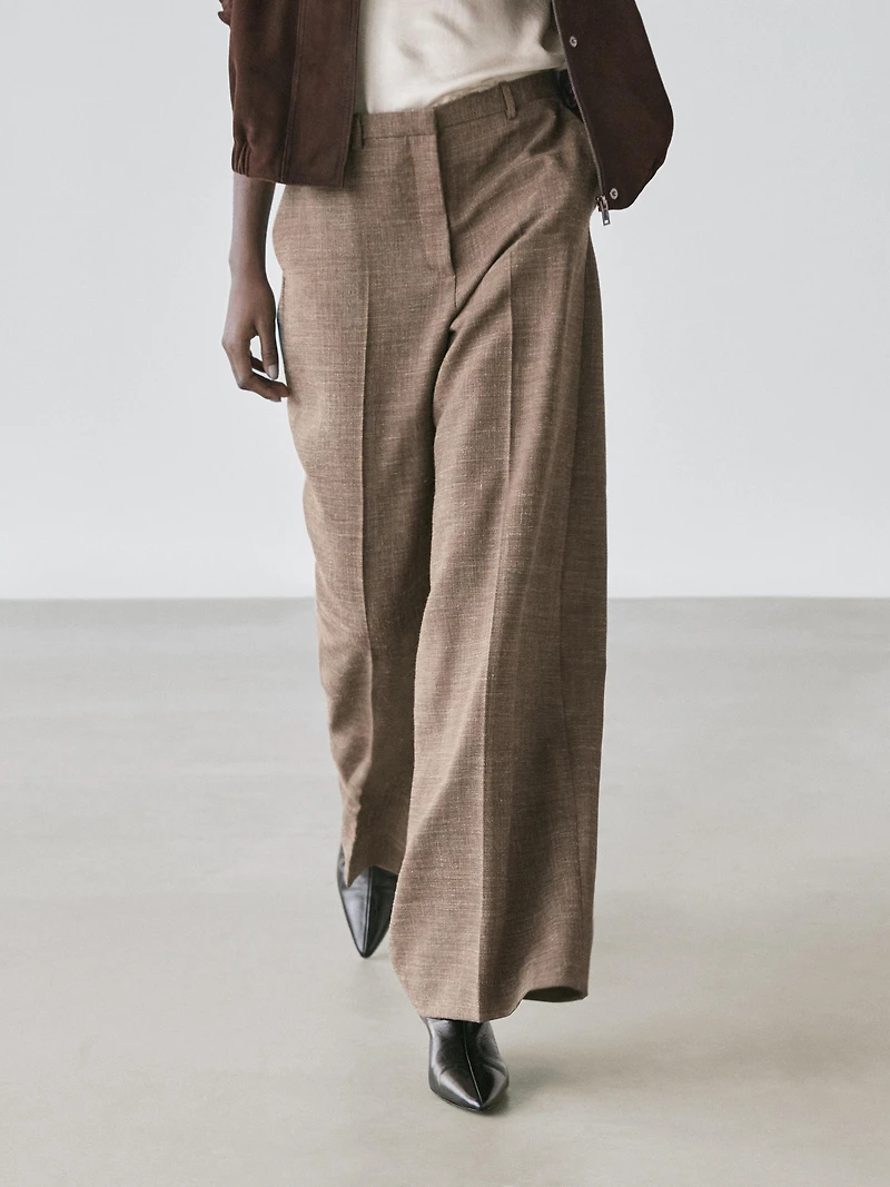 Wide-leg voluminous wool blend trousers