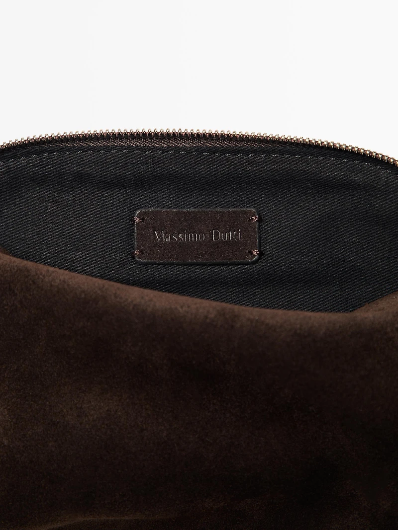 Petite trousse de toilette en croûte cuir