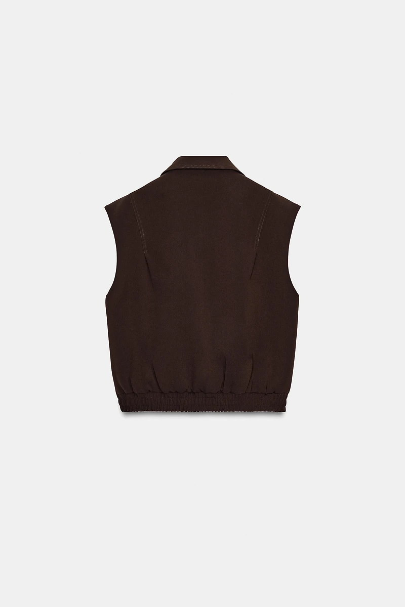 ELASTIC HEM SHOULDER PAD VEST