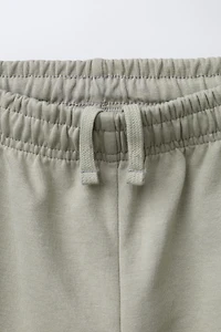 INTERLOCK SWEATSHIRT AND JOGGER SET WITH EMBOSSED TEXT