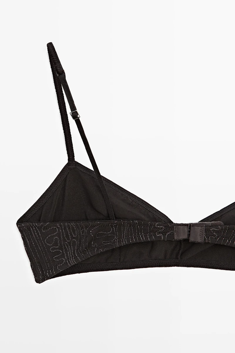 Top with embroidered detail