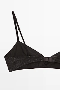 Top with embroidered detail