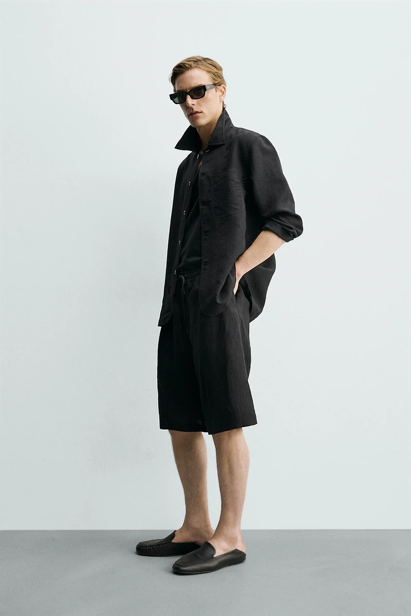 SHORT FLUIDE JACQUARD À RAYURES