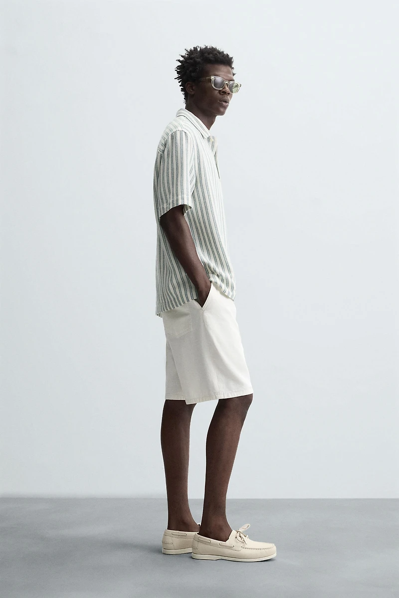 CHEMISE POLO STRUCTURÉE À CHEVRONS