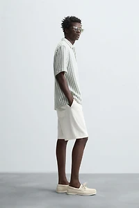 CHEMISE POLO STRUCTURÉE À CHEVRONS