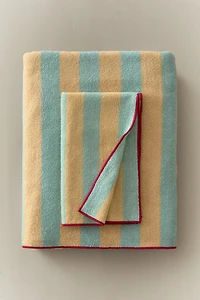 SERVIETTE DE BAIN RAYURES ET SURPIQÛRE