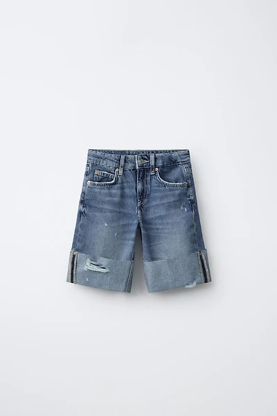 SHORT EN JEAN LONG DÉCHIRURES