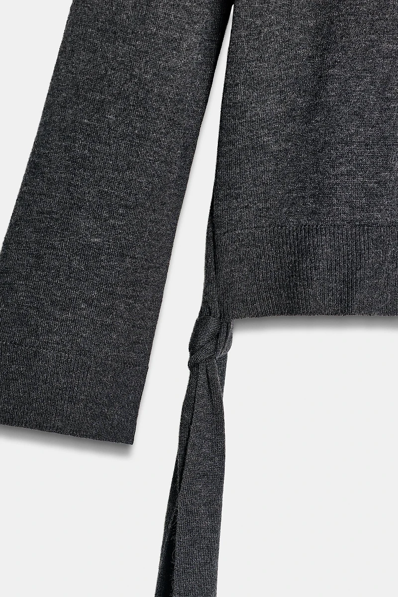 PLAIN KNIT JUMPER WITH SIDE STRAPS