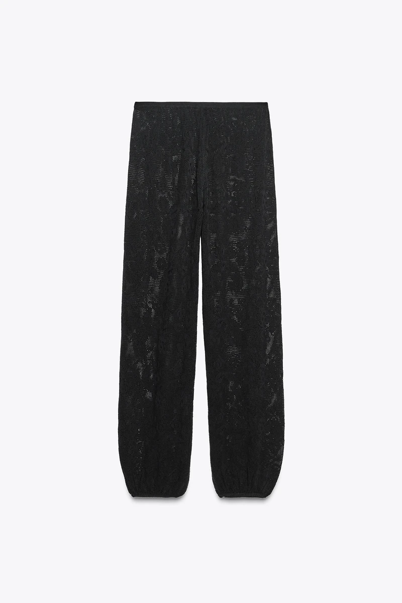 PANTALON EN MAILLE TEXTURÉE À FLEURS