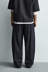 BALLOON FIT PLEATED PANTS