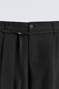 PANTALON BALLON FIT PLIS CEINTURE