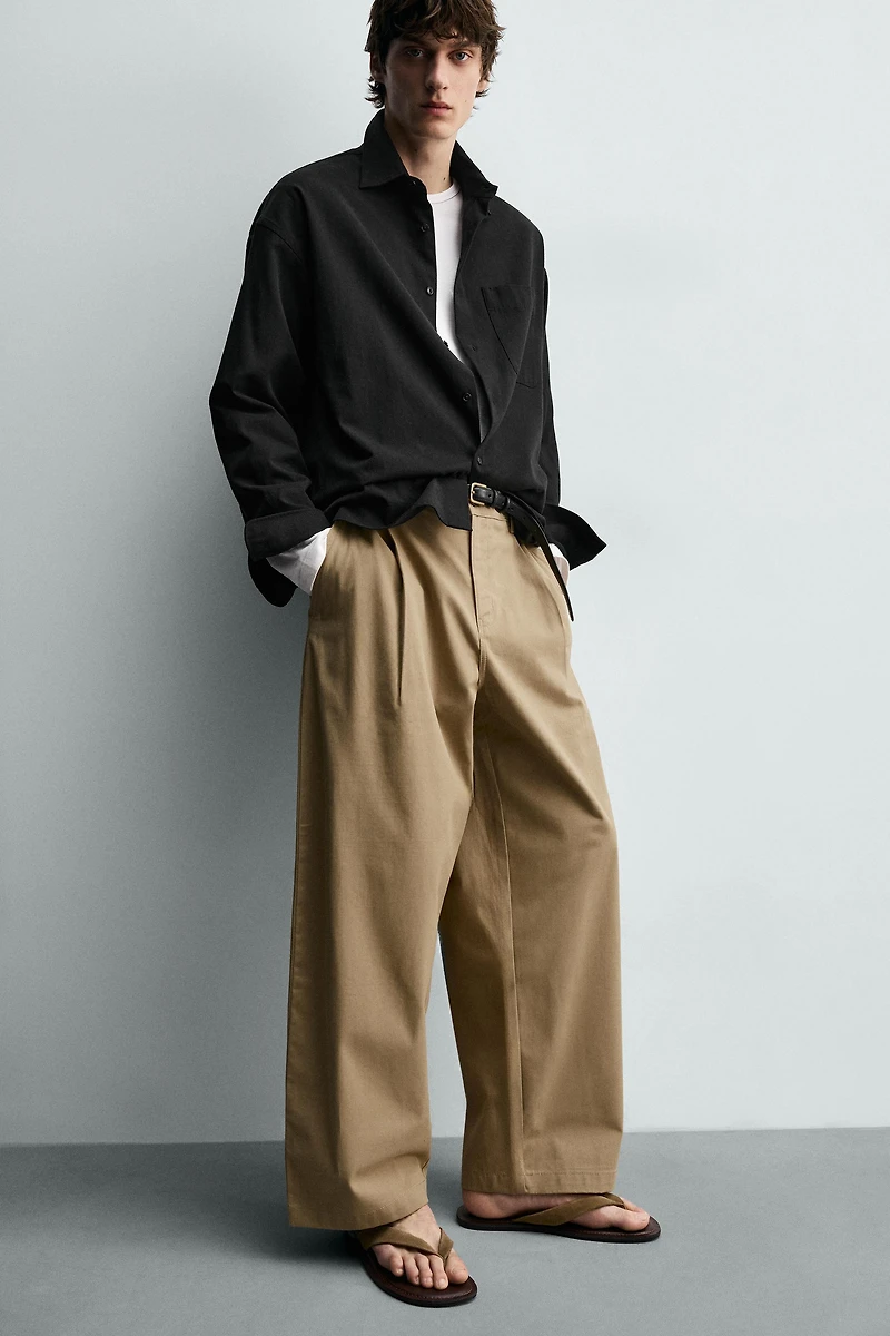 PANTALON COUPE LARGE À PLIS
