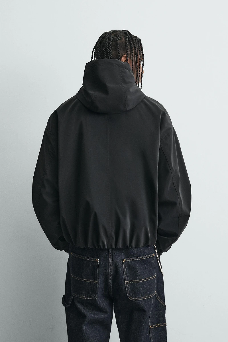 BLOUSON TECHNIQUE LÉGER À CAPUCHE