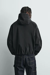 BLOUSON TECHNIQUE LÉGER À CAPUCHE