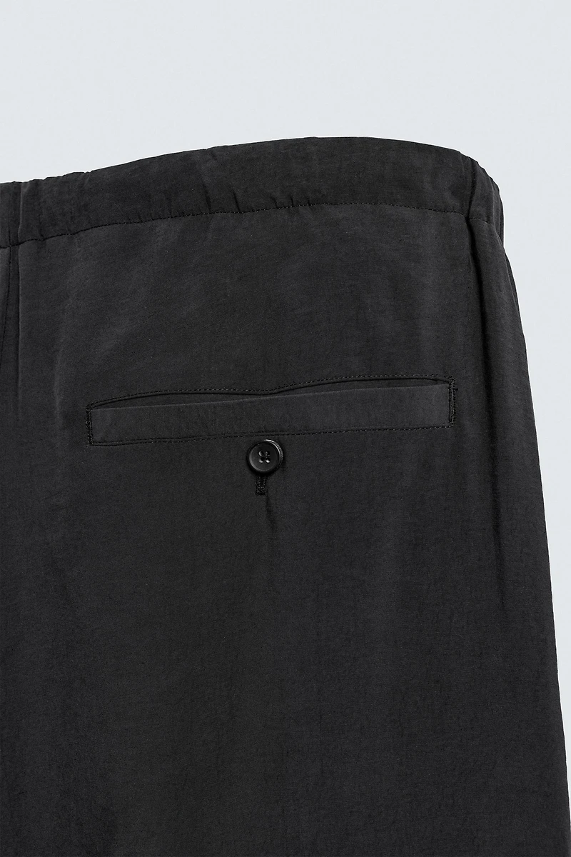 RELAXED FIT FLOWY PANTS
