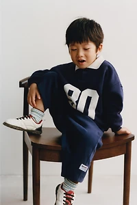 NUMBER PRINT POLO SWEATSHIRT