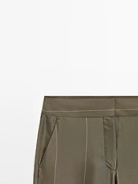 Flowing trousers with striped details