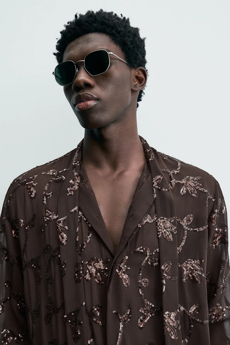 CHEMISE SEMI-TRANSPARENTE À PAILLETTES LIMITED EDITION