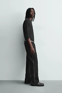 FLARE FIT JEANS WITH STUDS