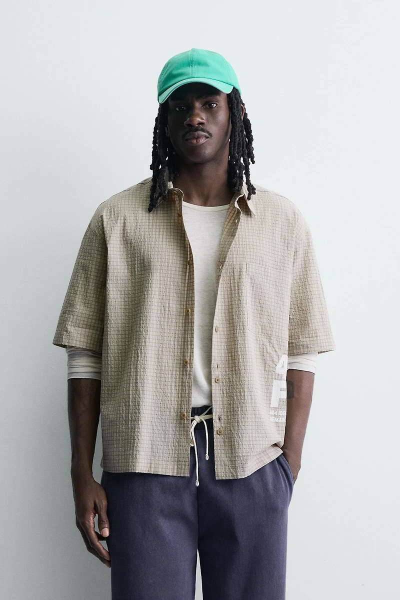 PLAID SHIRT WITH PRINTED TEXT
