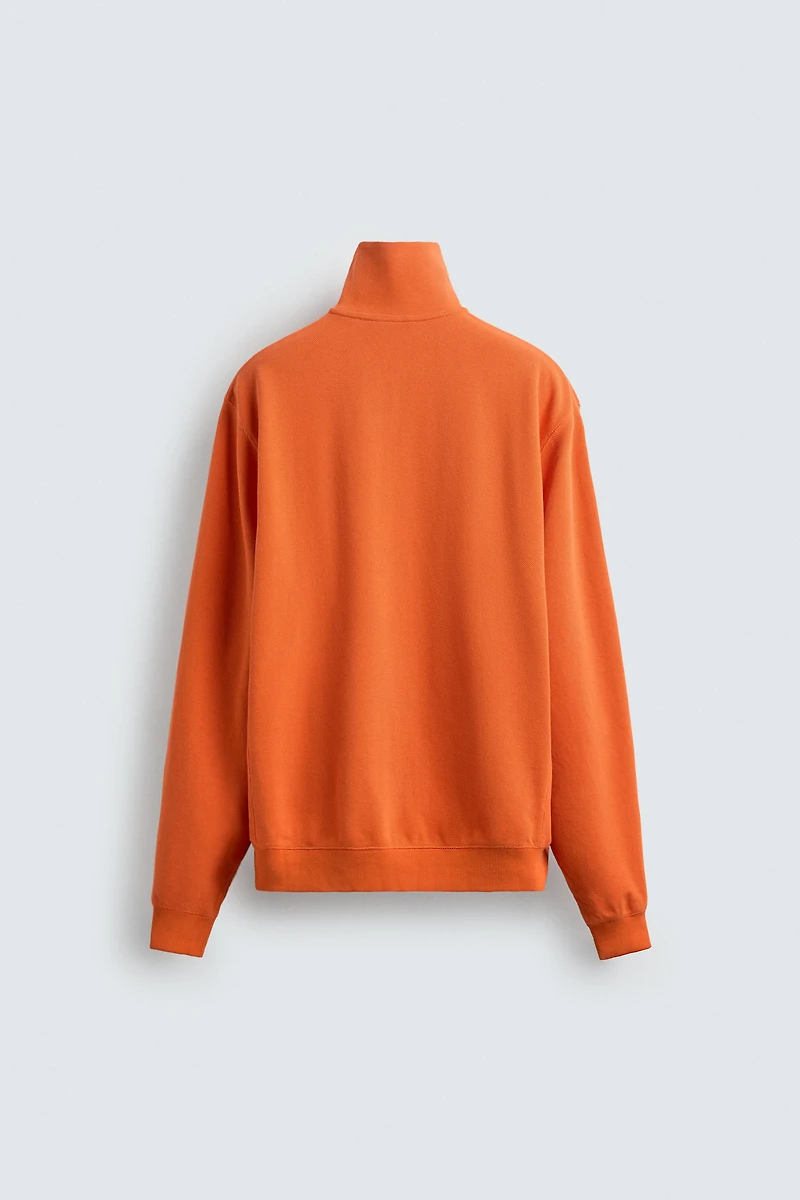 PIQUÉ QUARTER-ZIP SWEATSHIRT