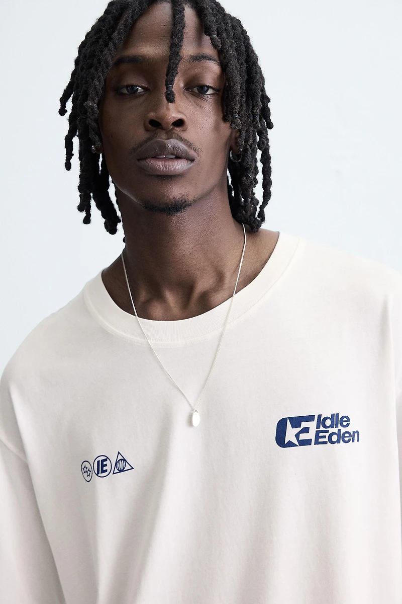 TEE-SHIRT À INSCRIPTIONS IMPRIMÉES
