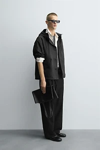 BLOUSON TECHNIQUE À CAPUCHE