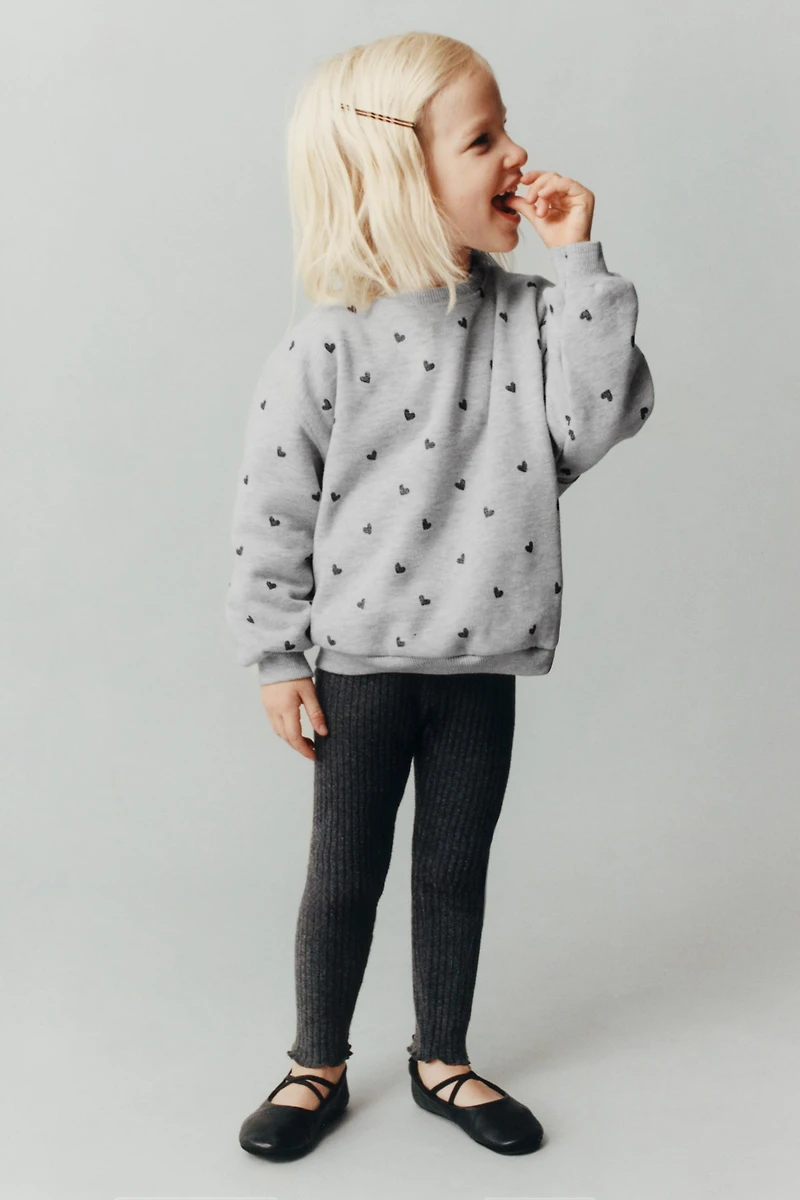 SWEAT À IMPRIMÉ BRILLANT