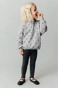 SWEAT À IMPRIMÉ BRILLANT