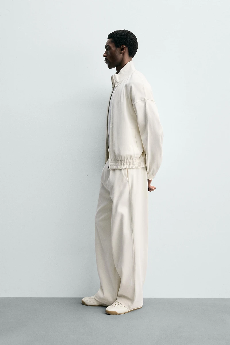 PLEATED WIDE FIT JOGGER PANTS