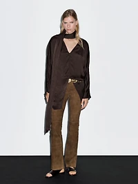 Long flowing blouse with tied neck