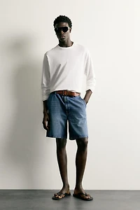 WAXED-EFFECT DENIM BERMUDA SHORTS