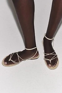 STRAPPY LEATHER FLAT SANDALS