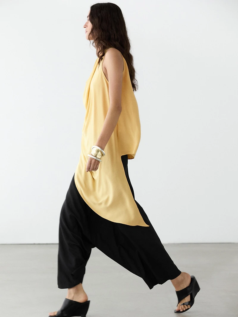 Long flowing asymmetric top