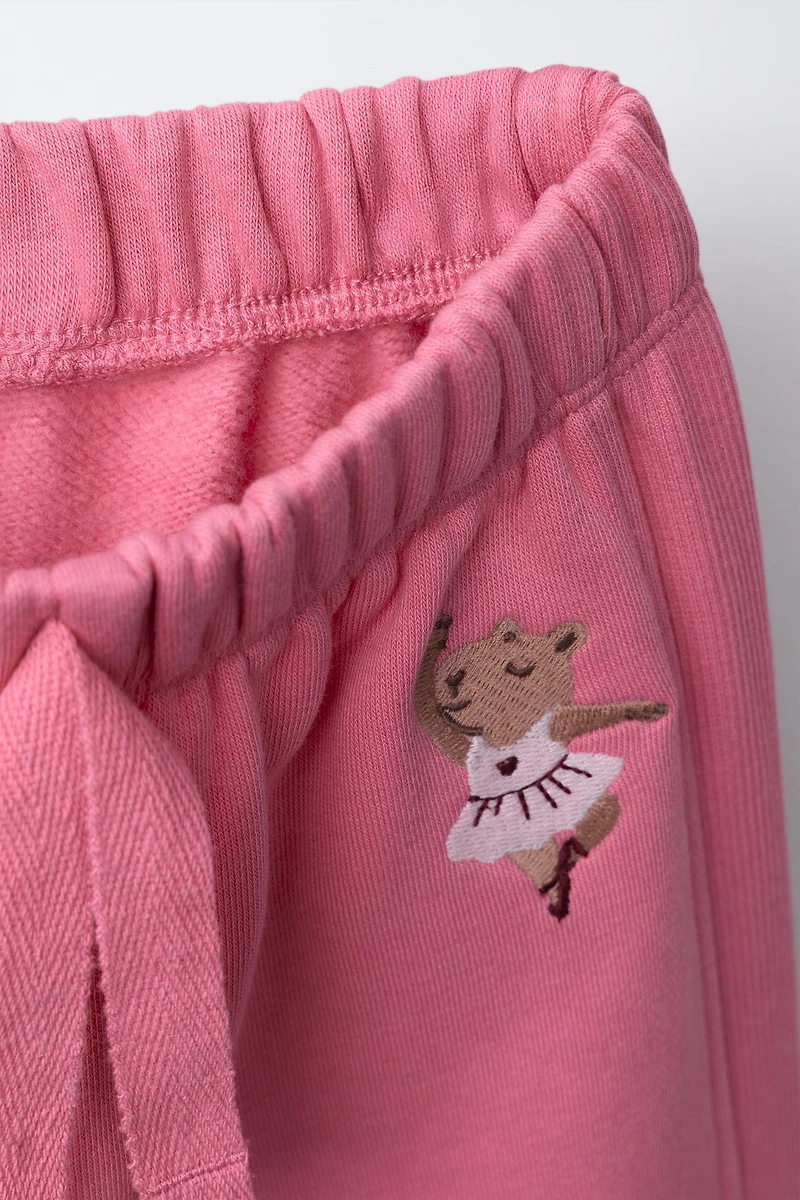EMBROIDERED CAPYBARA WIDE LEG PLUSH PANTS