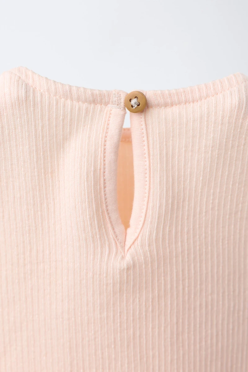 SUN EMBROIDERED RUFFLED BODYSUIT