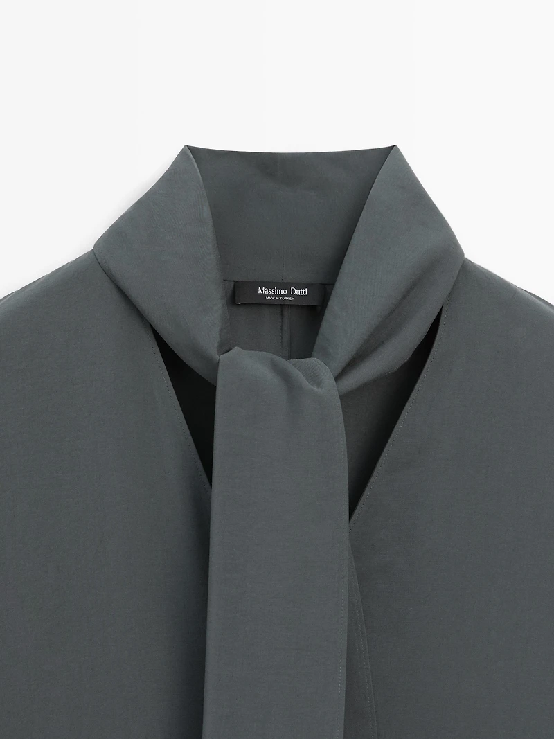 V-neckline midi dress with tie detail