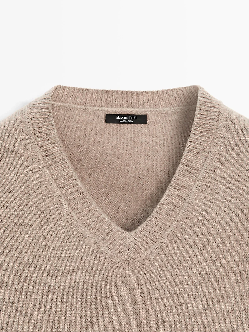 V-neck knit sweater with elbow patches
