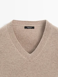 V-neck knit sweater with elbow patches