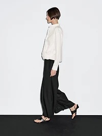 100% cotton shirt with draped asymmetric hem