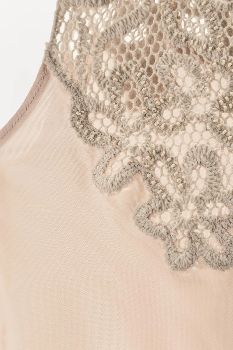 ROBE ASYMÉTRIQUE AU CROCHET LIMITED EDITION