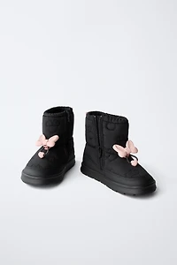 BOTTES DÉPERLANTES MINNIE MOUSE © DISNEY