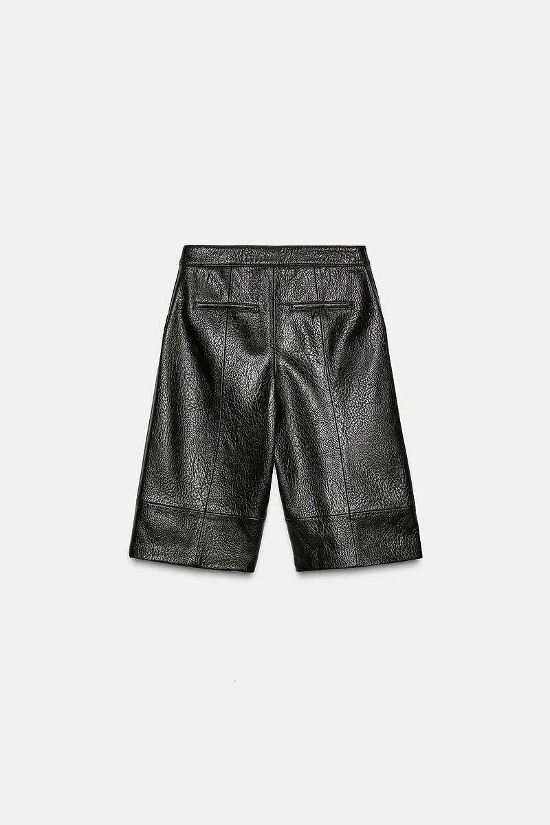 SHORT LONGUE MATIÈRE SYNTHÉTIQUE