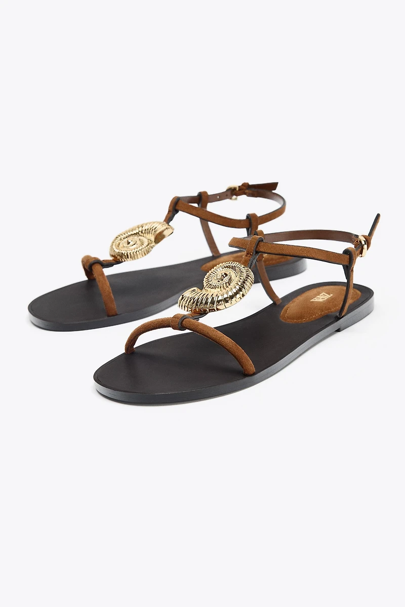 FLAT SANDALS WITH METALLIC TRIM