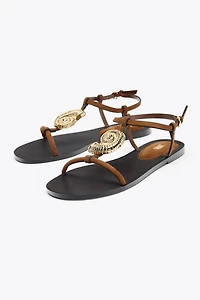 FLAT SANDALS WITH METALLIC TRIM