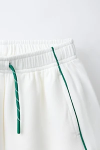 RIBBED SHORTS WITH CONTRAST PIPING