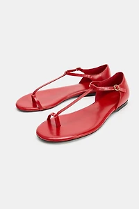 SANDALES PLATES EN CUIR À BRIDES
